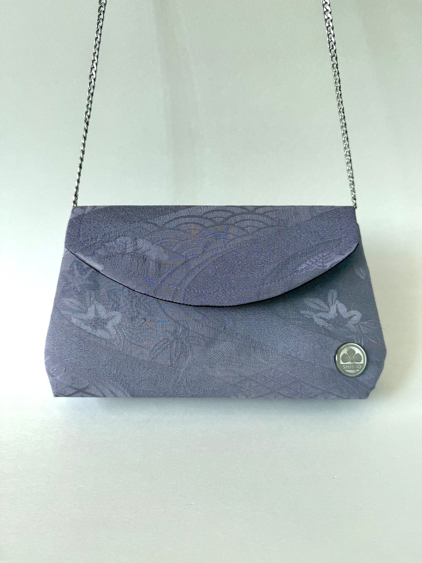 Purple kimono chirimen silk fold over clutch bag handing from detachable metal chain strap