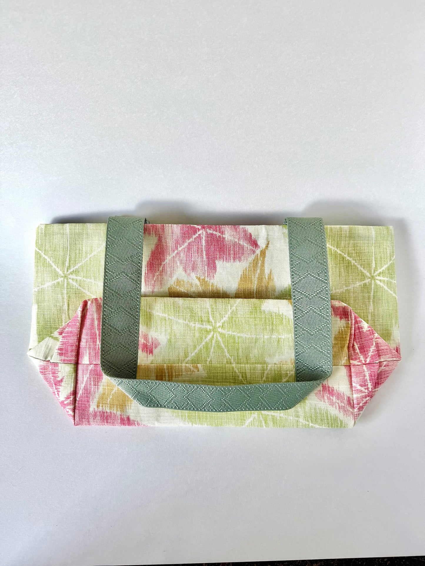 Backside of folded kimono silk tote bag laying flat showing sewn seams