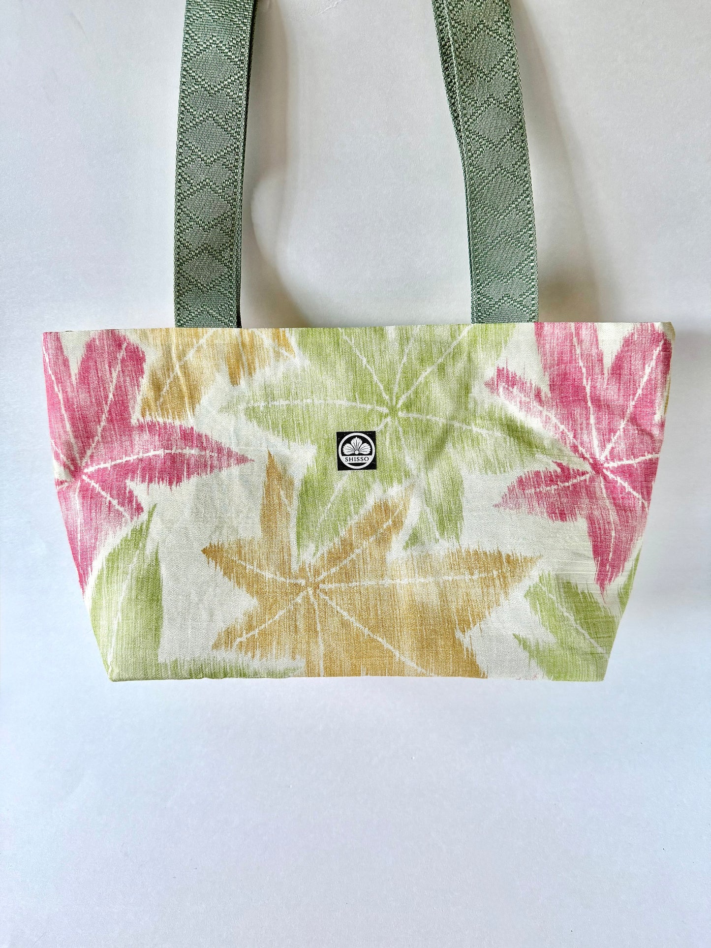 vintage kimono silk tote bag with autumn hues of green, red, and yellow maple leaf pattern