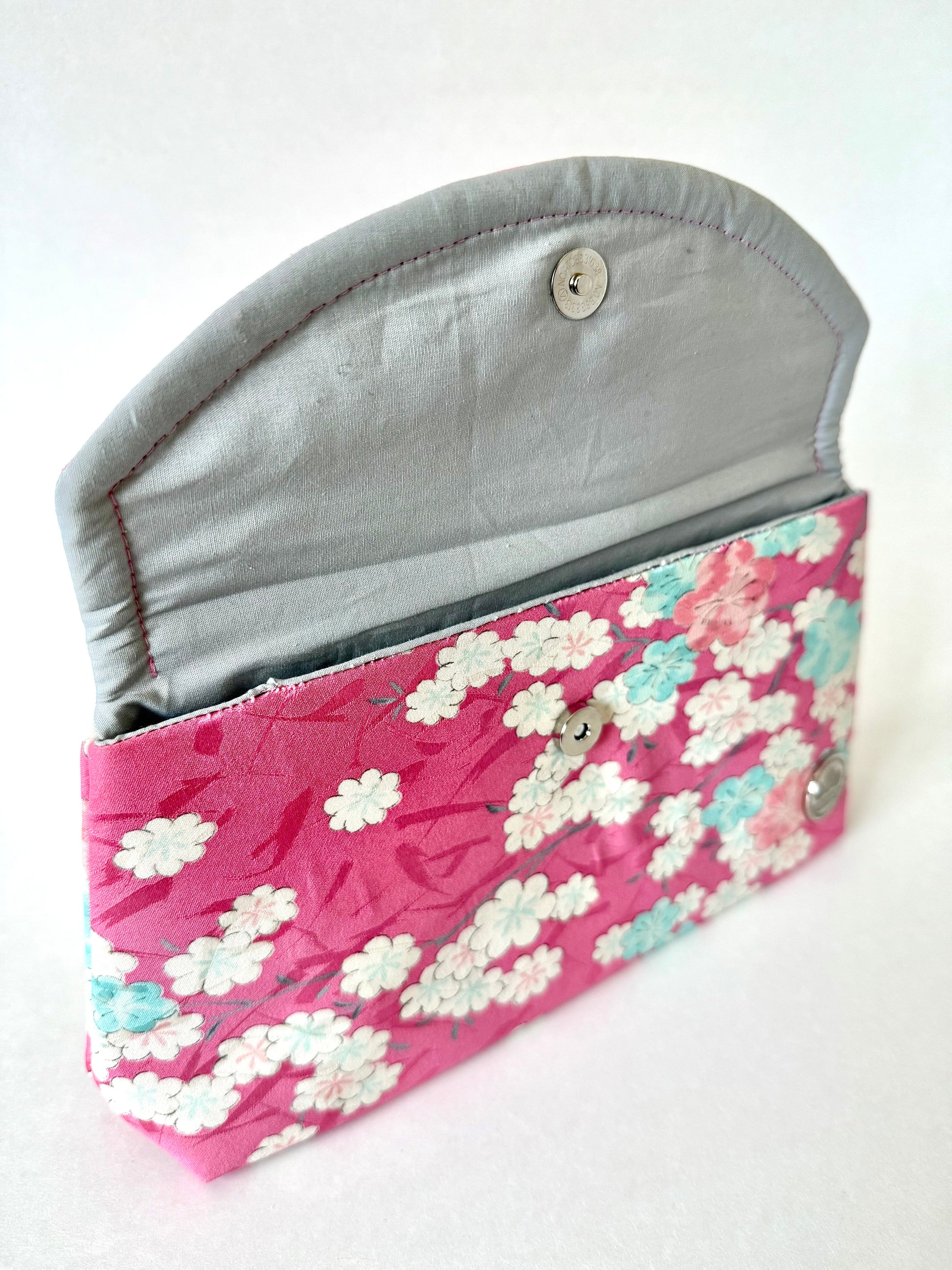 Hand stitched seam detail on kimono silk bag with sakura motif