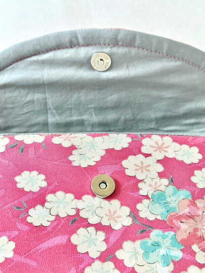 Close up of magnetic closure and pink kimono silk