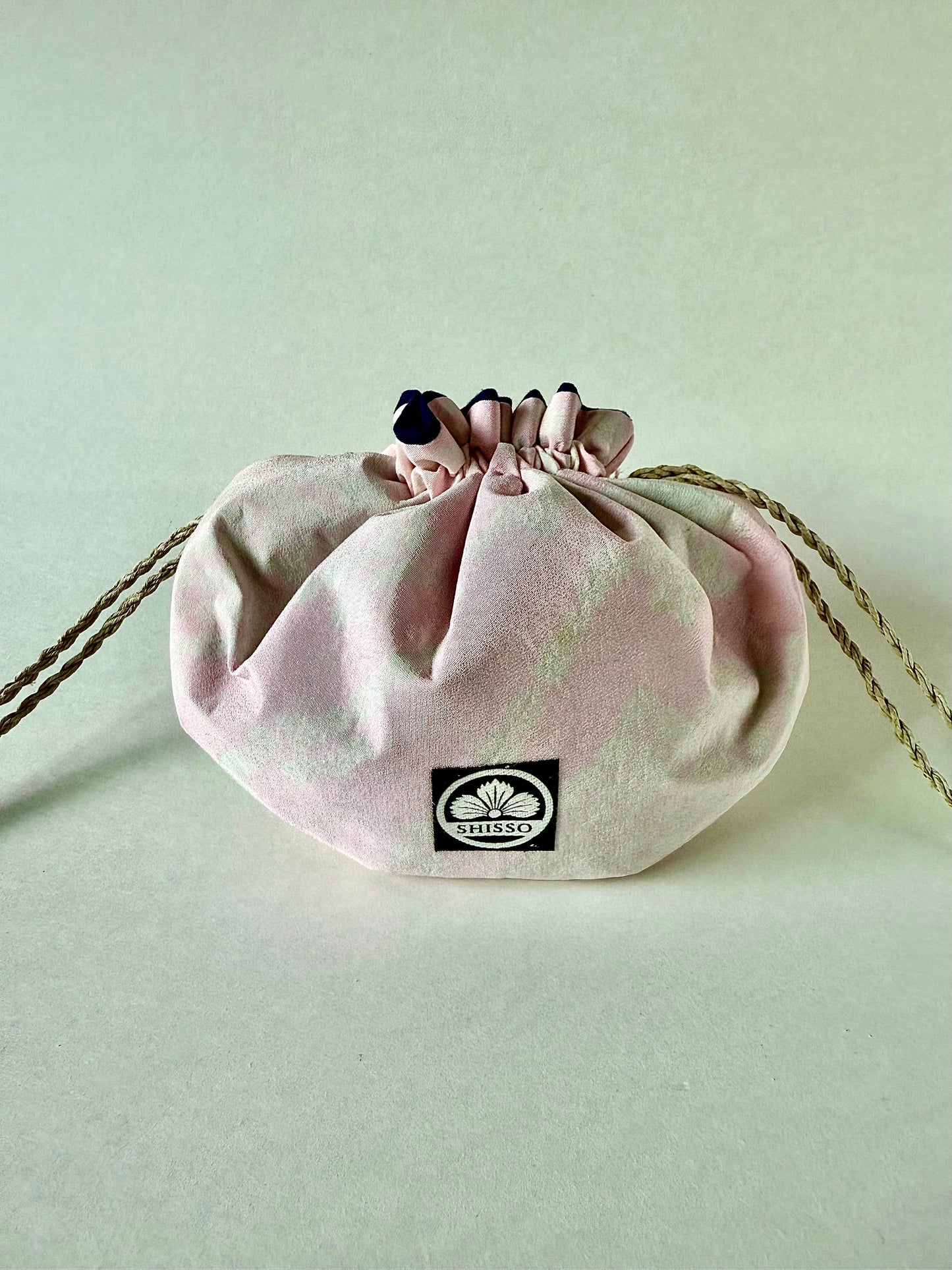 Pink kimono silk drawstring pouch cinched with hemp cords