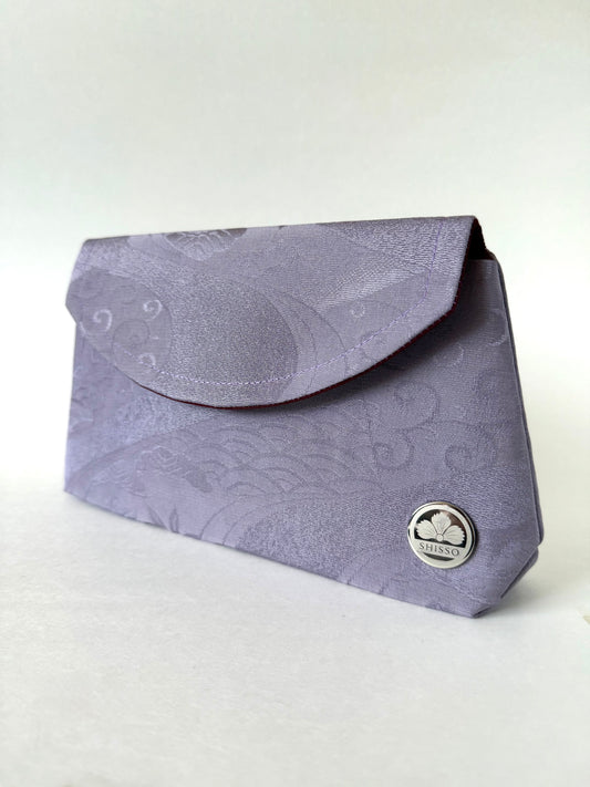 Purple chirimen kimono silk clutch bag featuring flowing streams motifs and wagara patterns