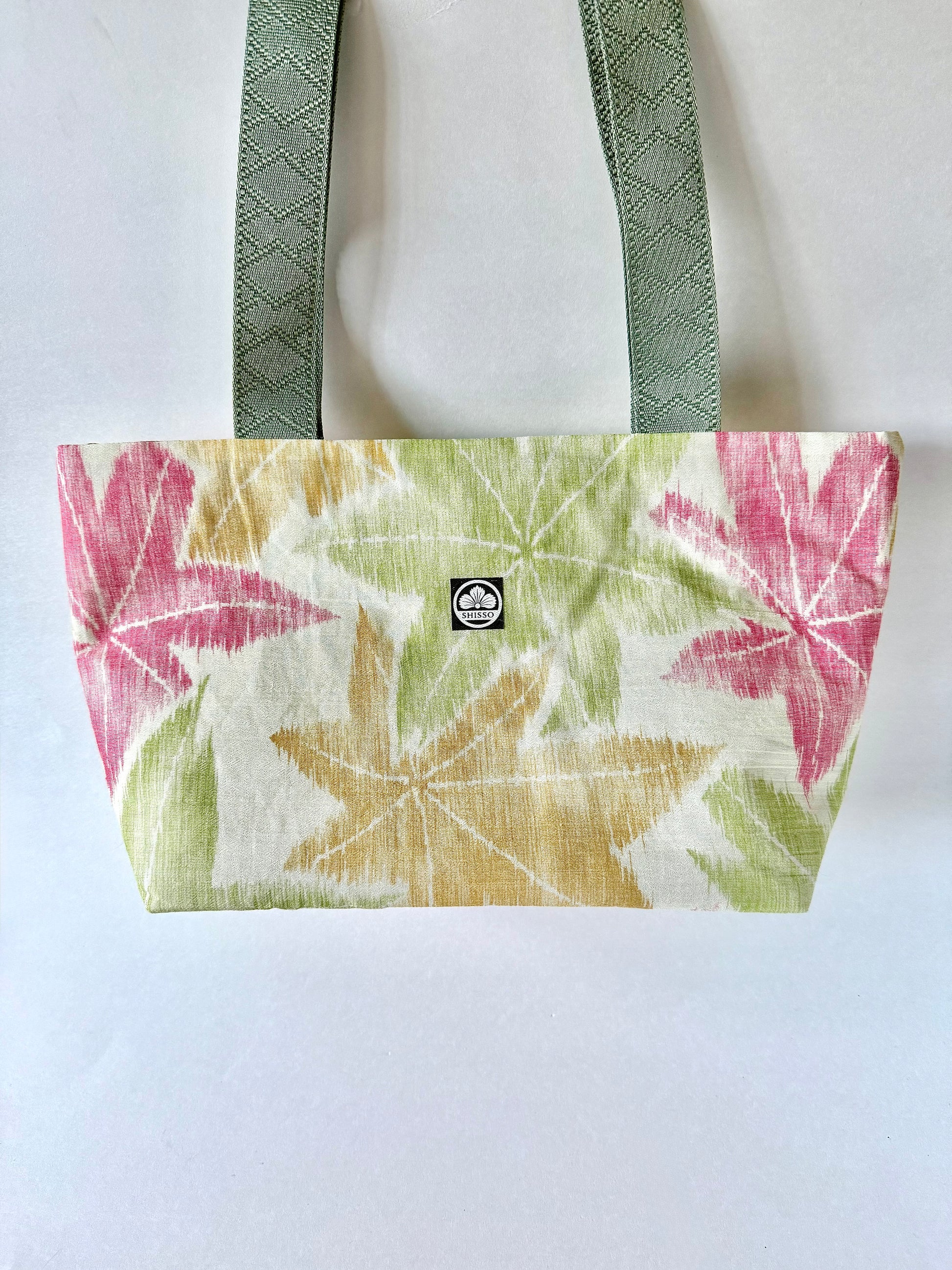 vintage kimono silk tote bag with autumn hues of green, red, and yellow maple leaf pattern